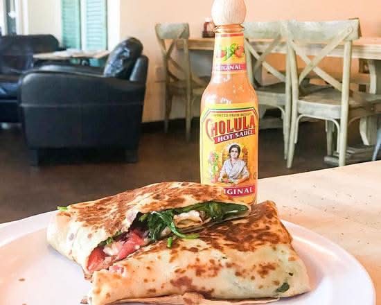 Greek Crepe. Fresh spinach, fresh tomatoes, mushrooms sauteed in extra virgin olive oil, kalamata olives & feta cheese